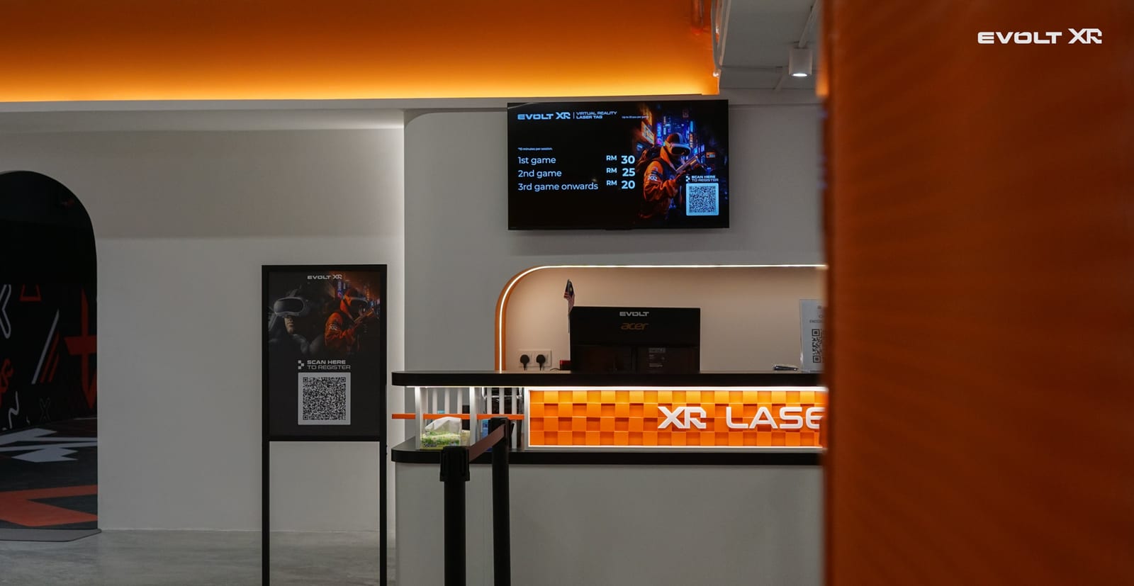 Evolt XR Selangor reception counter and XR Laser signage